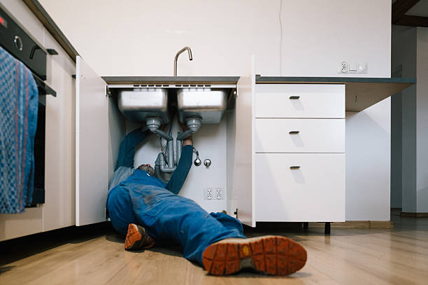 Professional Emergency Plumber technician working in Big Lake, MN